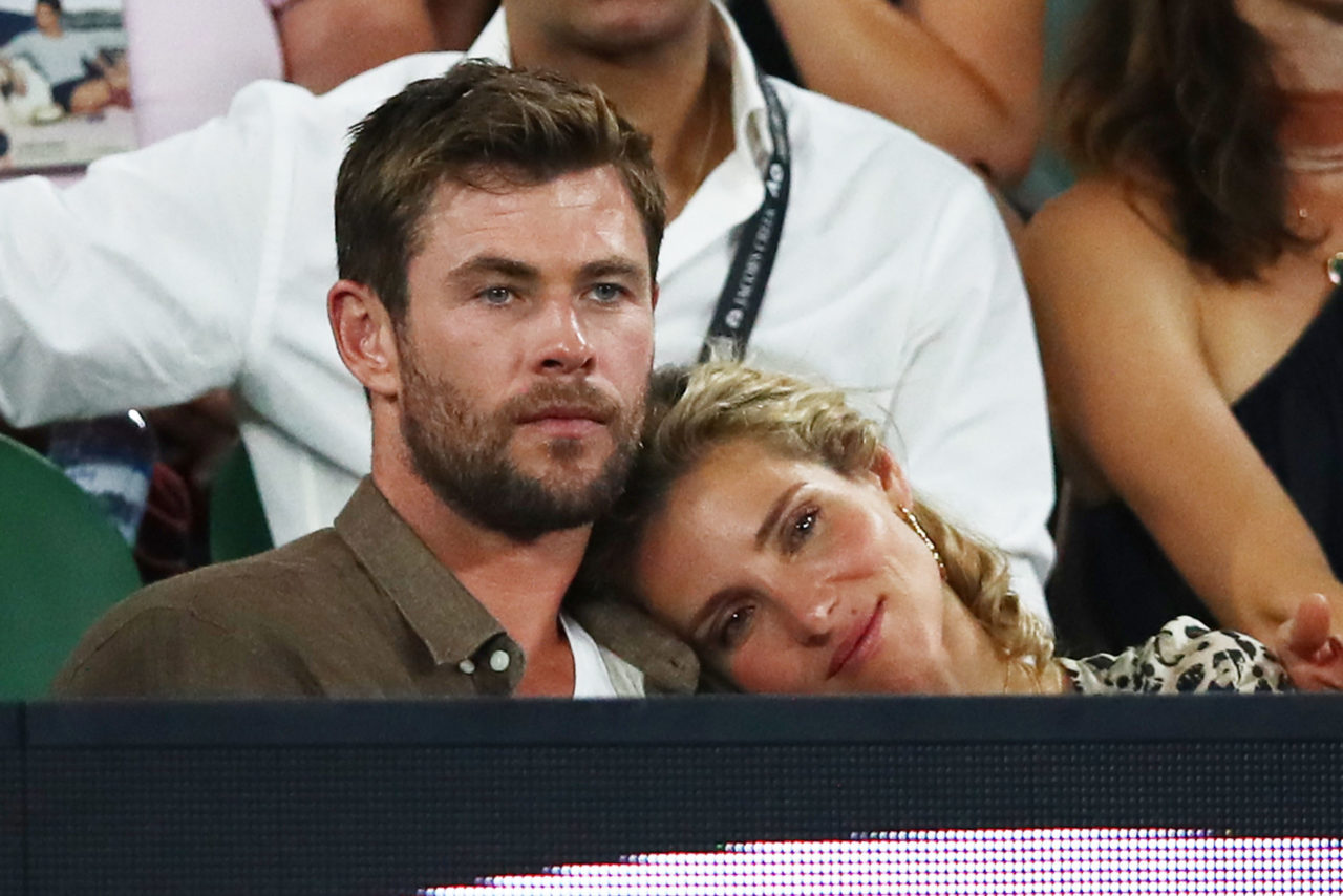 Chris Hemsworth and his wife Elsa Pataky watch the men's singles final match between Roger Federer ...